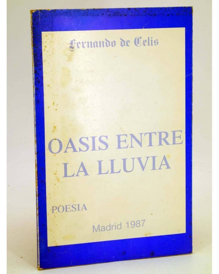Cubierta de OASIS ENTRE LA LLUVIA (Fernando De Celis) Madrid 1987